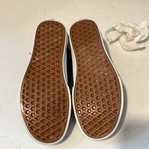 Black Vans sneakers, used very gently. Women’s 7 men’s 5.5.